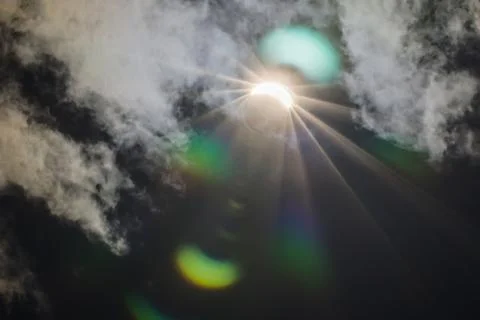Partial Solar Eclipse Through Clouds Fotos Stock