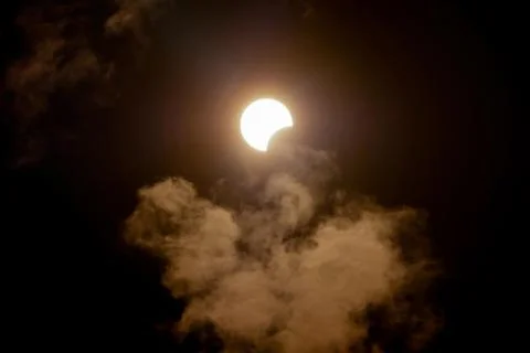 Partial solar eclipse viewed under cloudy skies. Stavropol on 21th June 2020 Stock Illustration