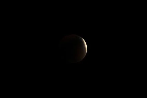 Partial before total lunar eclipse 2015 Stock Photos