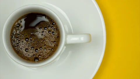 Partial view of cup of espresso. Stop motion. Stock Footage 124494389