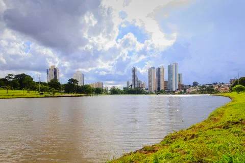 Partial view of the lake in the Parque das Naes Indgenas and buildings in the Stock Photos