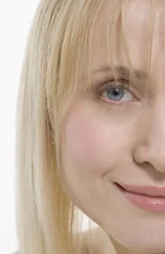 Partial view of smiling woman's face Stock Photos
