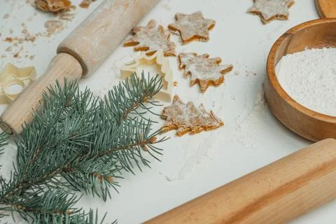 Partially blurred raw gingerbread cookie in shape of christmas trees and star Stock Photos