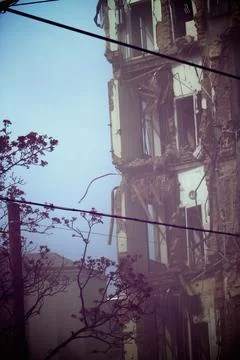 Partially Collapsed Building in Mist Stock Photos