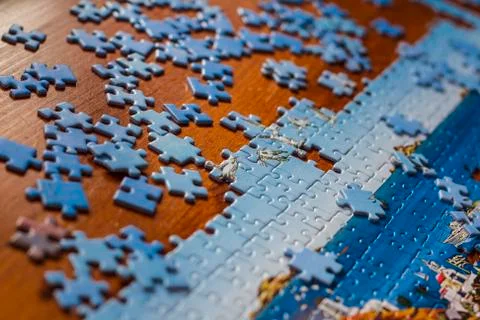 Partially solved jigsaw puzzle Stock-Fotos