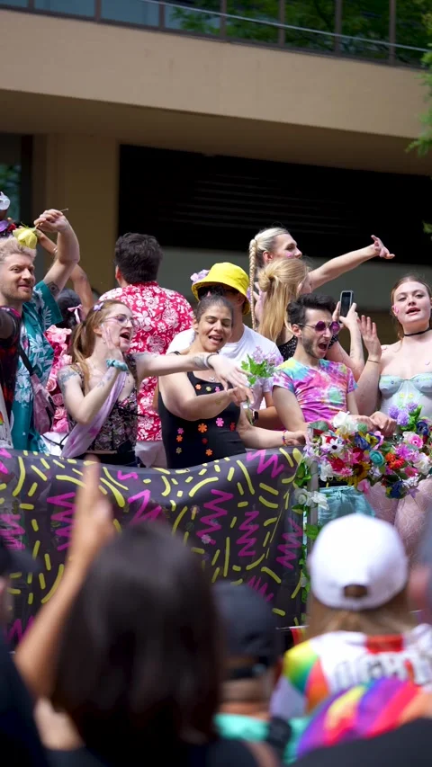 Participants on Parade Float Throwing Flowers During Pride Festival in Toronto 스톡 동영상 332018112
