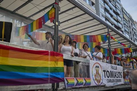 Participants ride decorated float during Pride parade celebration Stock Photos