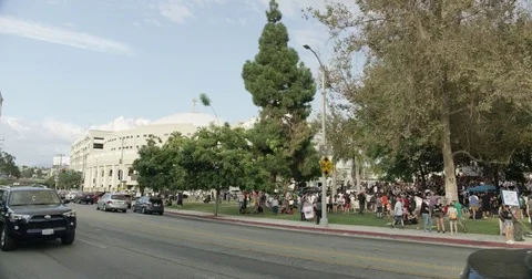 Participants supporting DACA gather at Echo Park Lake. Los Angeles, California. Stock Footage 81574256