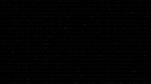 Particle effects yellow glowing lighting black screen loop animation overlay Stock Footage 277772973