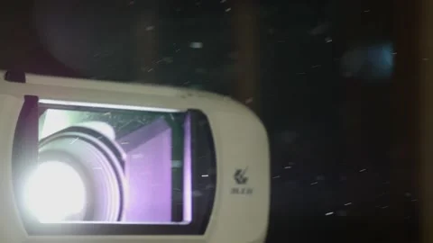 Particle projector dark Stock Footage 235428056