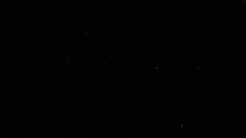 particles and dust on a black background | Stock Video | Pond5
