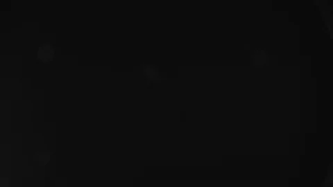 Particles On Black Stock Footage 75065592