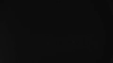 Particles On Black Stock Footage 75066760