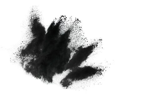 Particles of charcoal splatted on white background Stock Photos