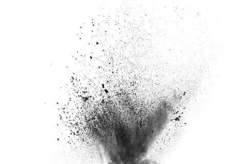 Particles of charcoal splatted on white background Stock Photos