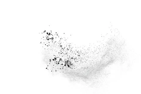The particles of charcoal splatted on white background. Stock Photos