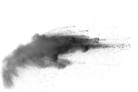 The particles of charcoal splatted on white background. Stock Photos