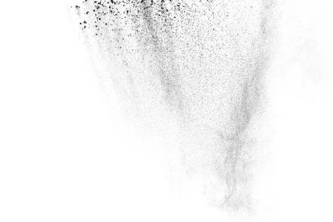 The particles of charcoal splatted on white background. Stock Photos