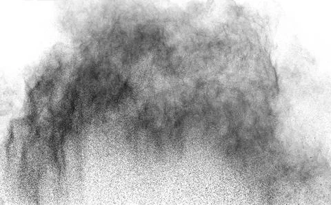 The particles of charcoal splatted on white background. Stock Photos