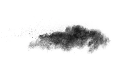 The particles of charcoal splatted on white background. Stock Photos