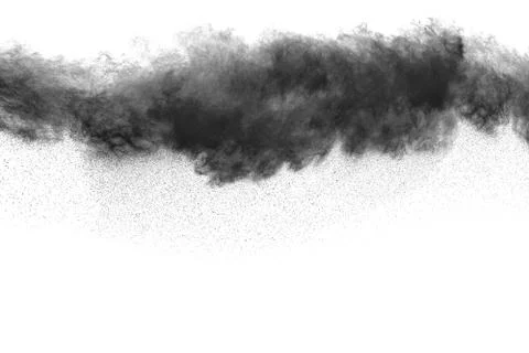 The particles of charcoal splatted on white background. Stock Photos