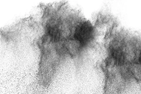 The particles of charcoal splatted on white background. Stock Photos