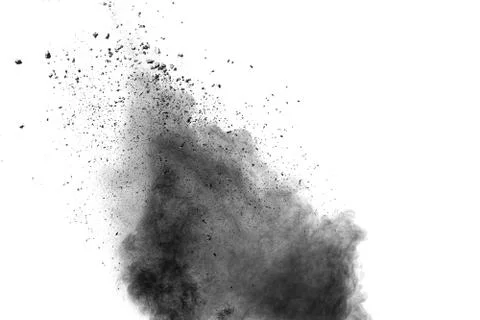 The particles of charcoal splatted on white background. Stock Photos