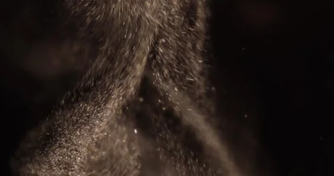 Particles close-up flying in the air over black background. Stock Footage 282619627