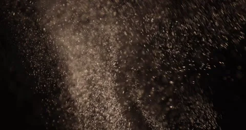 Particles close-up flying in the air over black background. Stock Footage 282619665