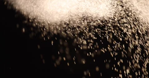 Particles close-up flying in the air over black background. Stock Footage 282619679