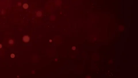 The particles on the dark red background are moving smoothly 스톡 동영상 277196294