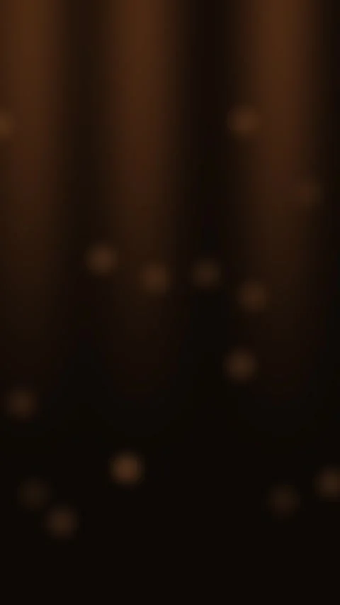 Particles drift through amber light and gentle waves Stock Footage 329292361