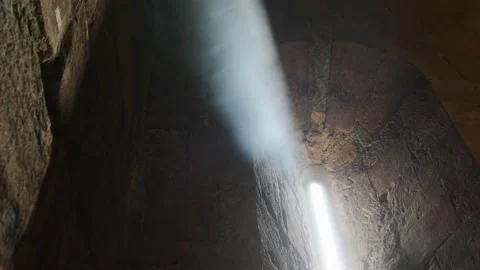 Particles of dust in the sun's ray passing through a small window. Stock Footage 221017632