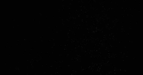 Particles floating on black background in slow motion overlay. Atmosphere filmed 스톡 동영상 217575339