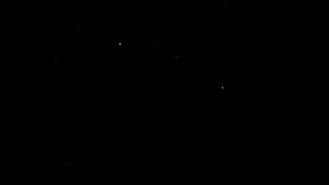 Particles flying on a black background. Colored particles flying erratically Video stock 71108073