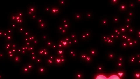 Particles flying upwards in the form of red hearts on a black background Stock Footage 268052472