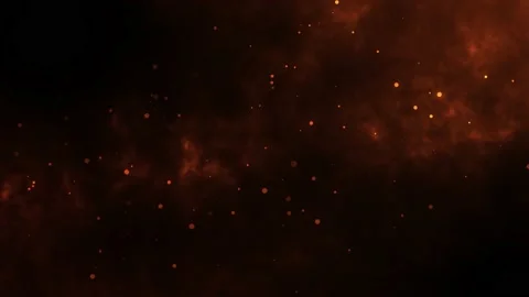Particles flying in wind on fire backgro... | Stock Video | Pond5