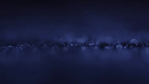 Particles Jumping On Black Music Speaker, Closeup View In Darkness Stock Footage 252946060