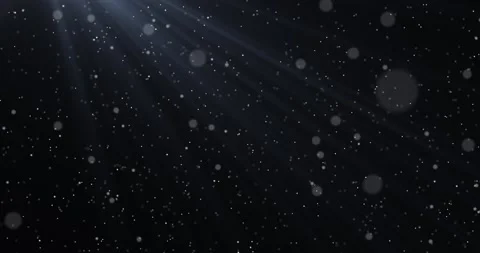 Particles rising upwards in the rays of light on a dark background 82 Stock Footage 310825863