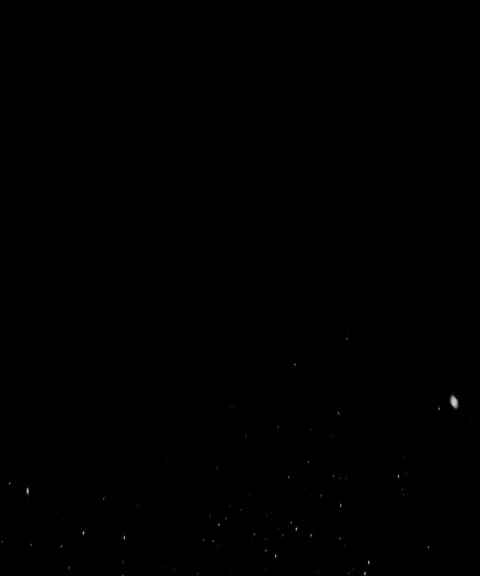 Particles spark flow on black background - 4k Stock Footage 102296055