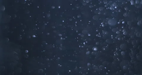 Particles in water background Stock Footage 245769862