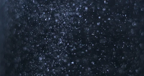 Particles in water background Stock Footage 245769957