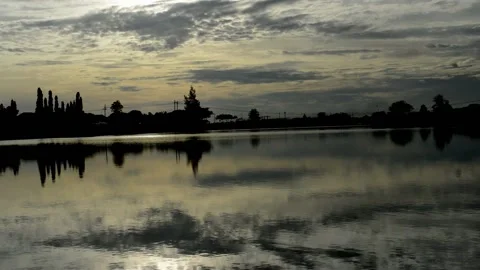 Partly cloudy and beautiful river reflection Video stock 236813474