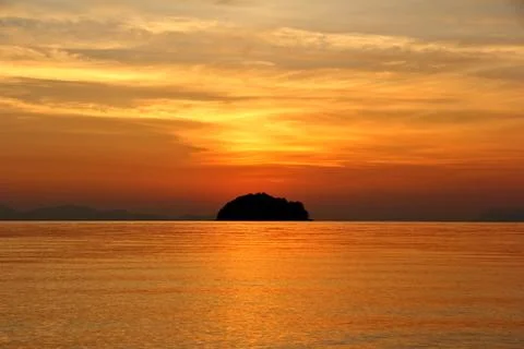 Partly cloudy in the evening sea. Stock Photos