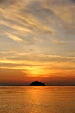 Partly cloudy in the evening sea. Stock Photos