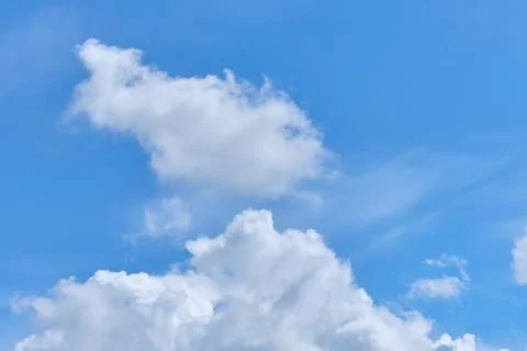 Partly cloudy in the summer in the sky. Stock Photos