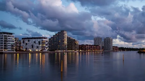 Partly Cloudy Sunset Timelapse Over Copenhagen's Illuminated Cityscape Stock-Footage 312985263