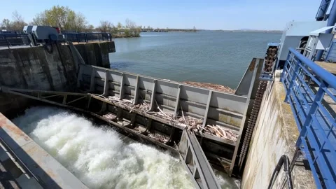 Partly Open Water Locks at a River Dam Sunny 4k Stock Footage 183427029