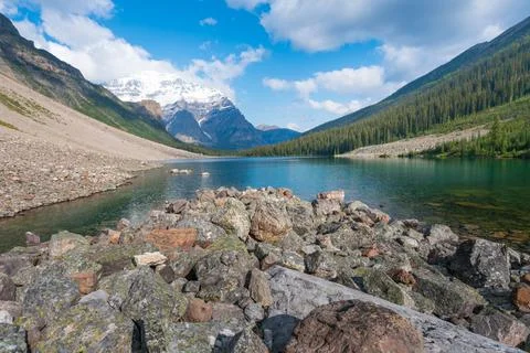 Partly sunny day with dramatic sky over Consolation Lakes in Banff National Park Stock Photos