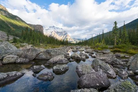 Partly sunny day with dramatic sky over Consolation Lakes in Banff National Park Stock Photos